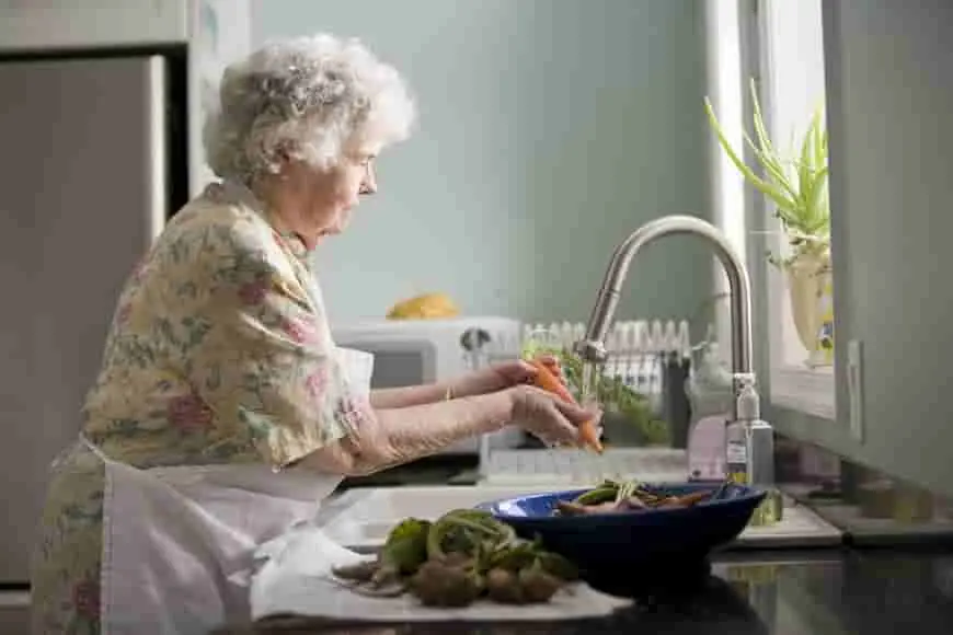 Compassionate elderly care - hand holding with care